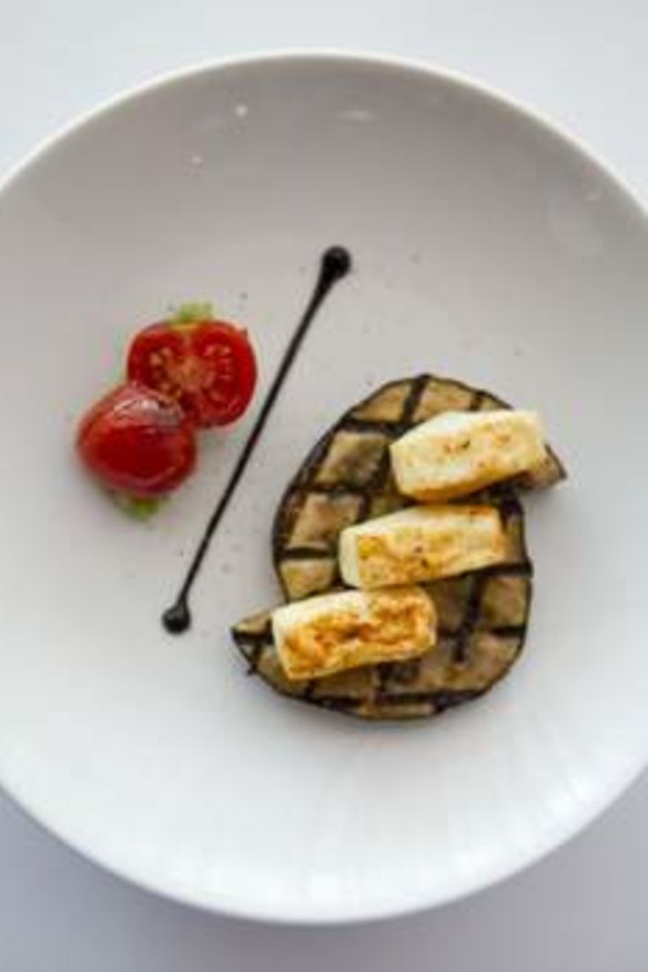 Tofu and eggplant with roasted tomatoes and black sesame, at the Lanterne Rooms.