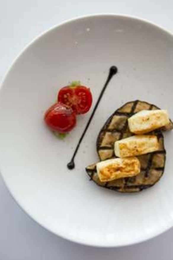 Tofu and eggplant with roasted tomatoes and black sesame, at the Lanterne Rooms.