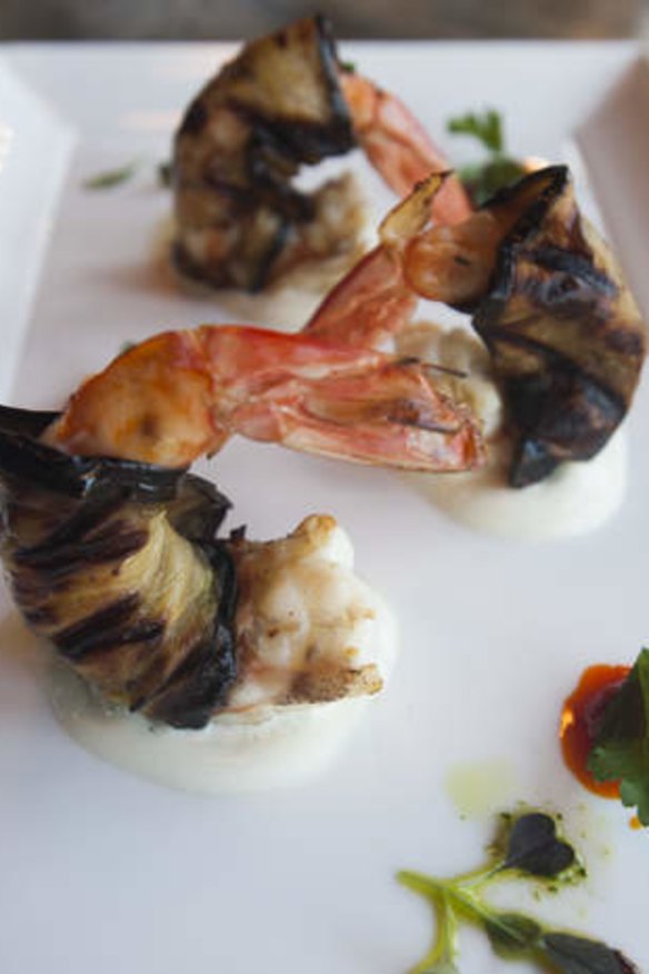 Char-grilled king prawns wrapped in eggplant.