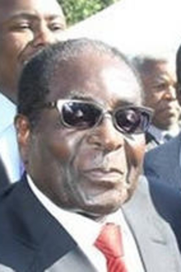 Psychology Maziwisa with  Zimbabwean President Robert Mugabe.