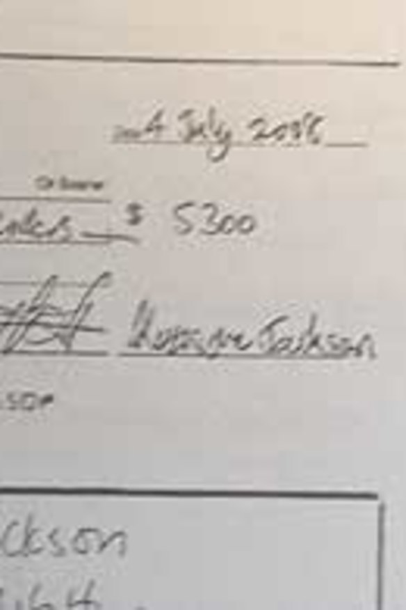A cheque signed by Kathy Jackson.