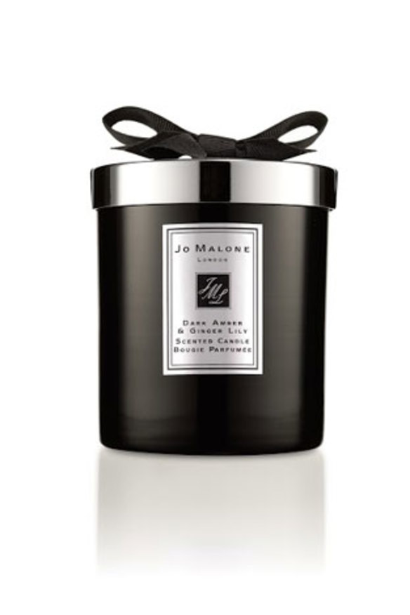 Dark amber and ginger lily scented candle.