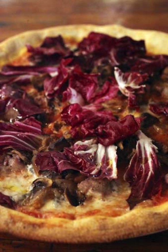 Otto Pizza, tomato sauce, sausage, mozzarella, wild mushrooms and radicchio.