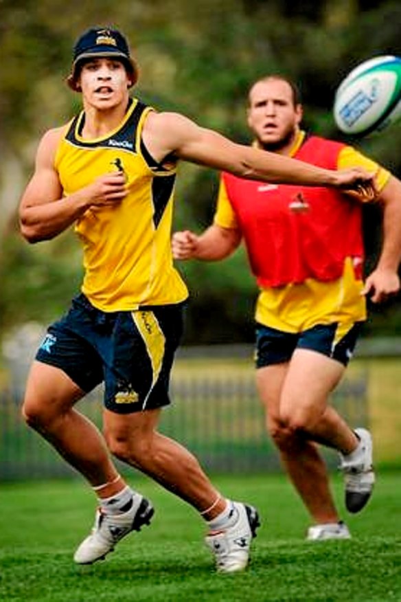 Brumbies player Matt Toomua gets a pass away  during a training session yesterday.