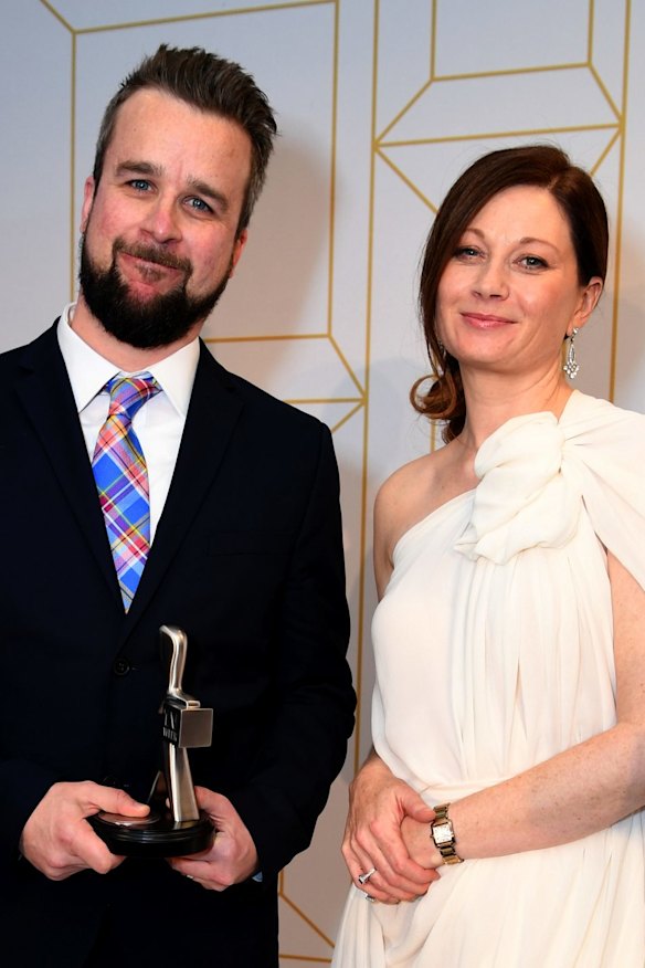 Four Corner's Justin Stevens and Morag Ramsay pose with their Logie award for the most outstanding news coverage.