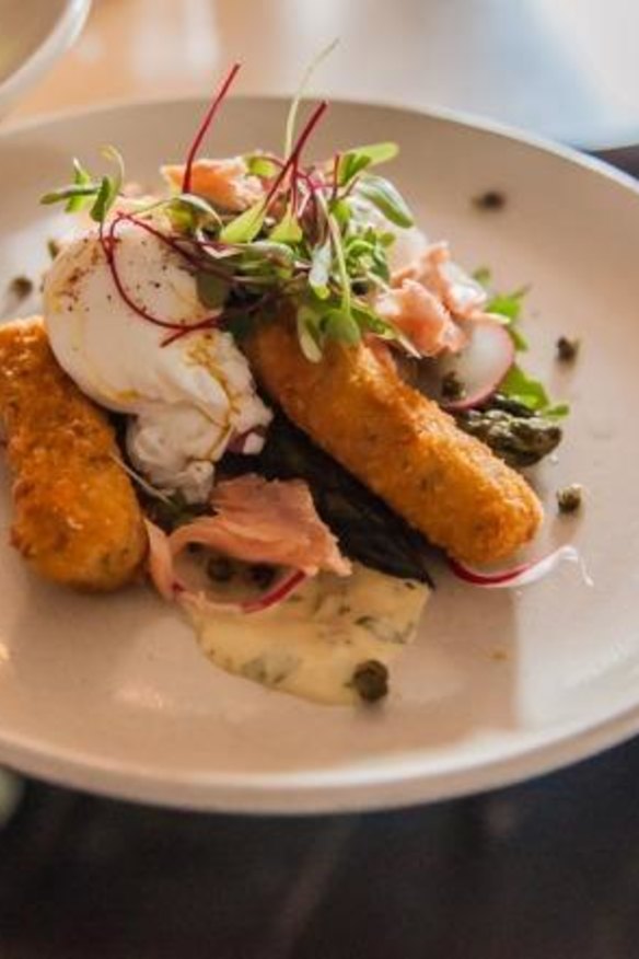 Smoked trout, poached eggs, capers and croquettes at Naughty Boy.