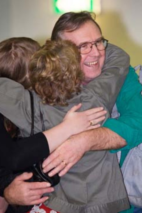 Greenpeace activist Colin Russell arrives home