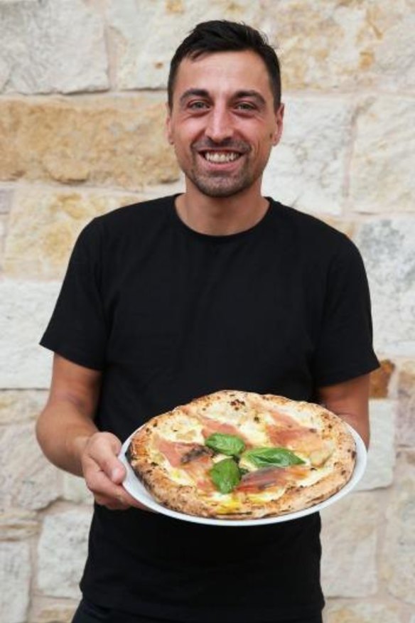 Lucio De Falco with one of his much-loved pizzas.