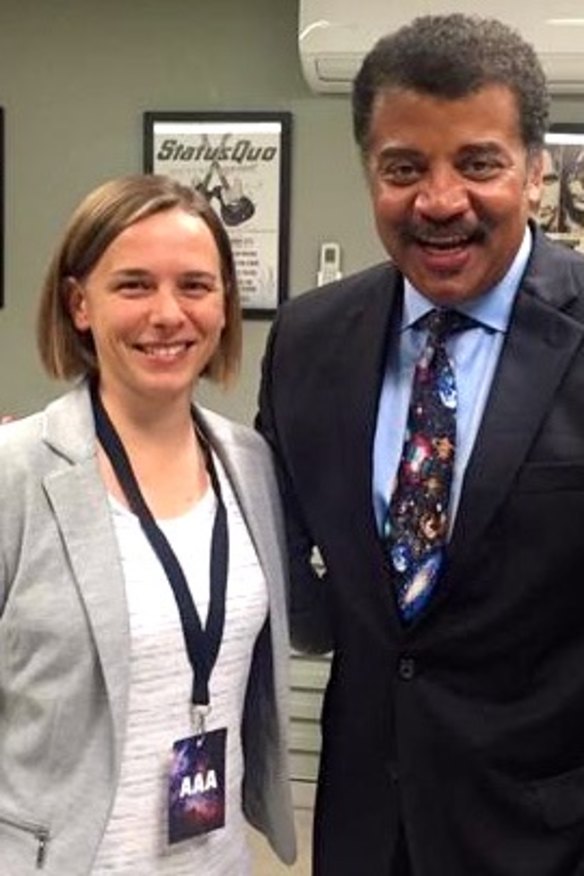 Harvey-Smith with renowned American astrophysicist Neil deGrasse Tyson in 2015.
