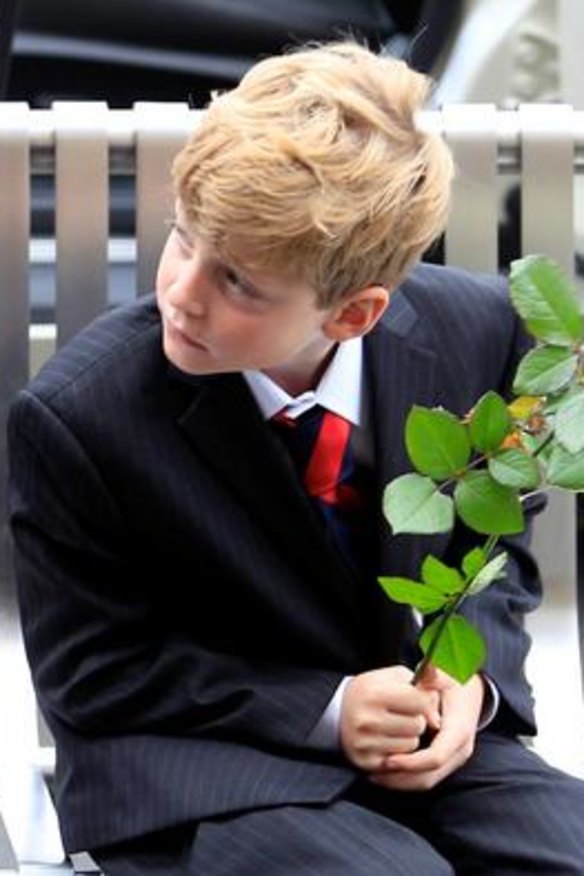 Son Tiernan with a white rose.