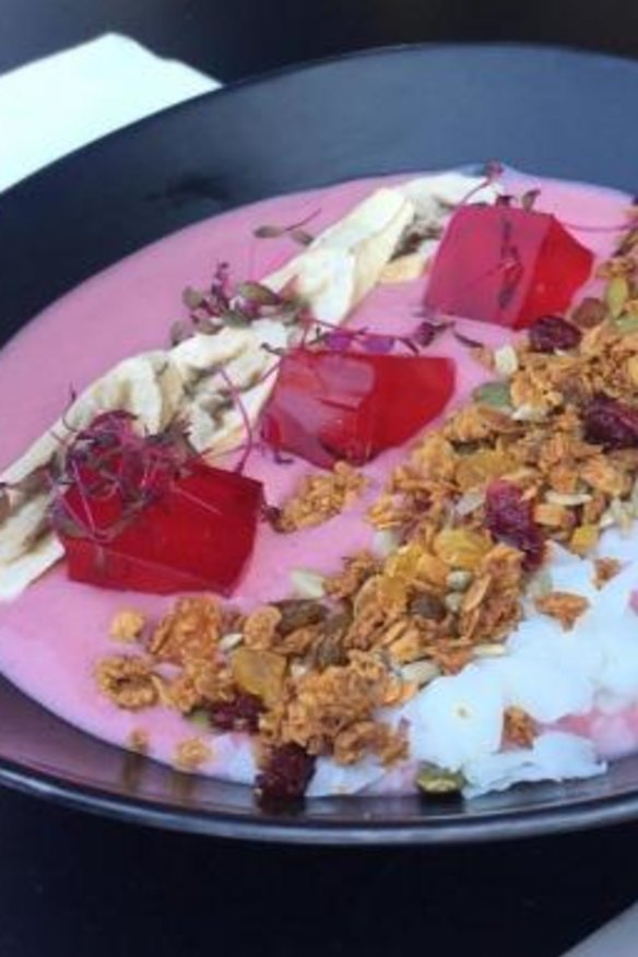 Acai bowl with raspberry jelly, granola and coconut flakes at Mister Zen.