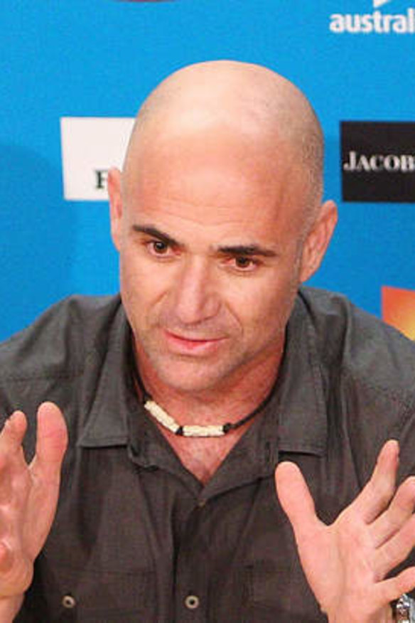 Andre Agassi talks to the press.