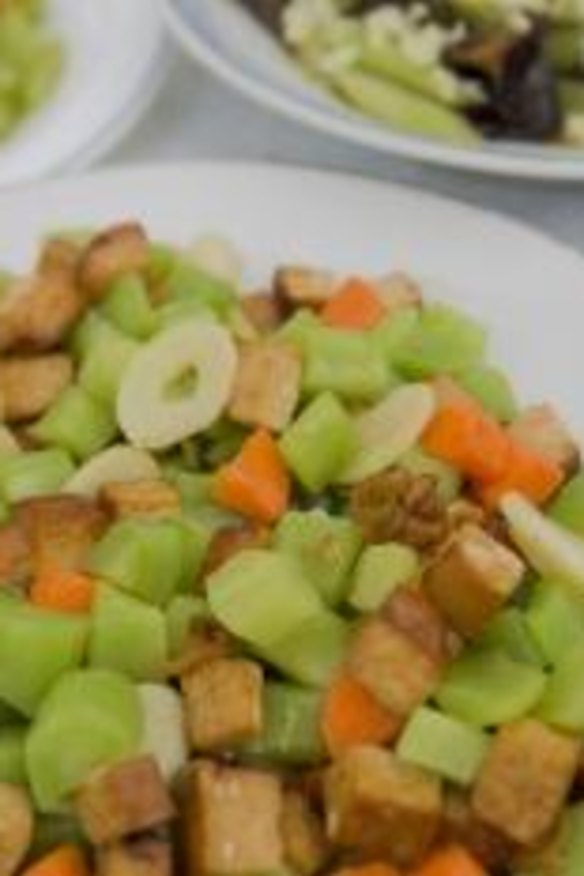 Popular: Chen's asparagus lettuce with hard tofu, carrot and bean curd.