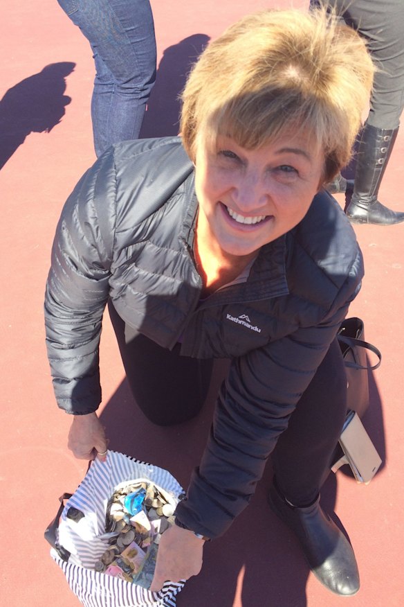 Belinda Barnier with the coins she collected for the Big Heart Project during her morning walk around Yarralumla and Braddon on Wednesday.