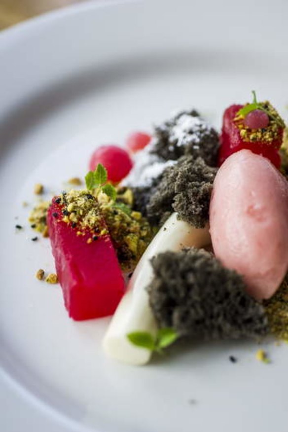 Intriguing ... Watermelon dessert has squares of poached watermelon, and scatters of black sesame cake.