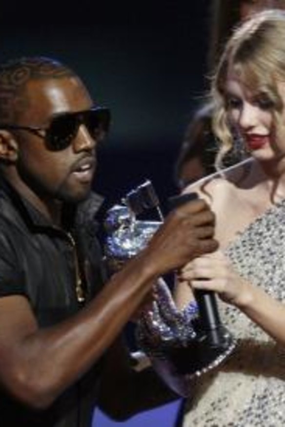 Kanye West takes the microphone from best female video winner Taylor Swift in 2009.