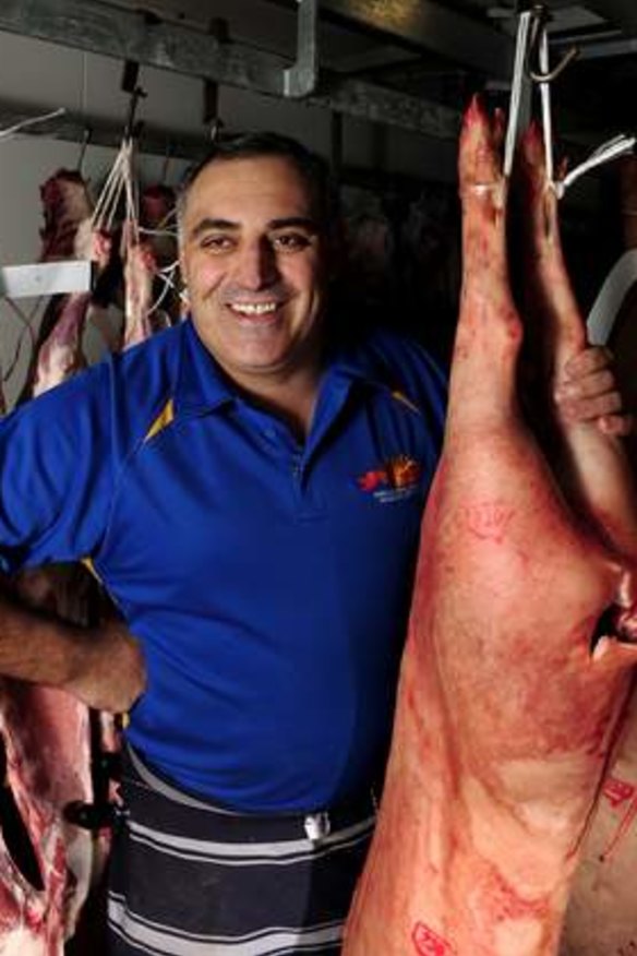 Gino D'Ambrosio, owner of Eco Meats in Belconnen Market, expects to sell about 120 hams.