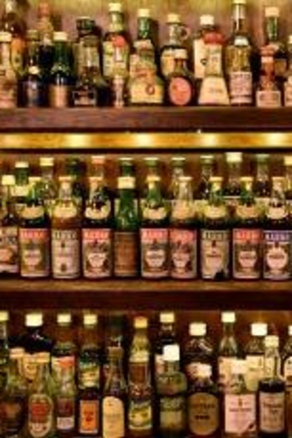 Miniature bottles on display at Restaurant Hubert in Sydney.