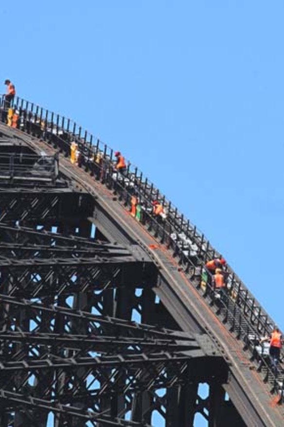 Countdown: Harbour Bridge technicians set up the New Year's Eve fireworks.
