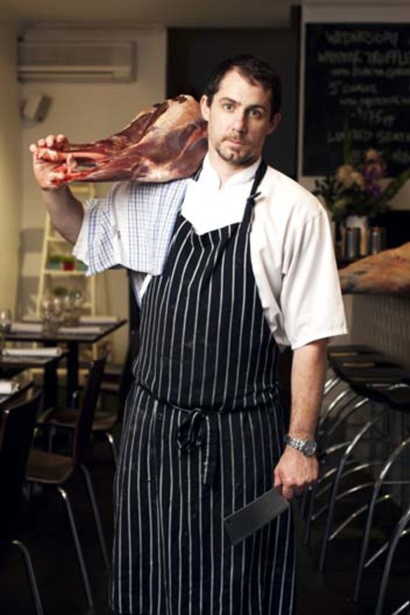 Cleaver way to trim costs: Chef Paul Cooper does the butchering at his Bishop Sessa restaurant in Surry Hills.