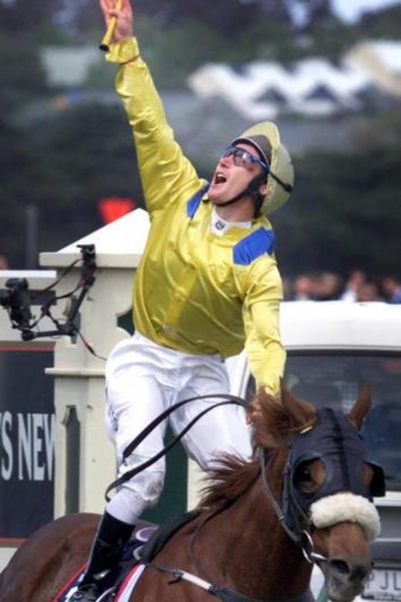 Top jockey Damien Oliver winning the Melbourne Cup in 2002.