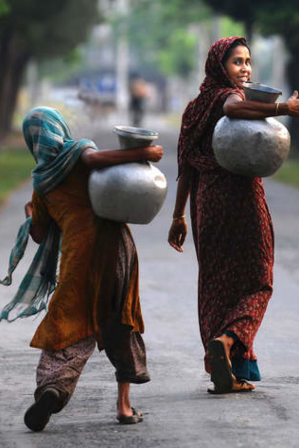 Women carrying drinking water.