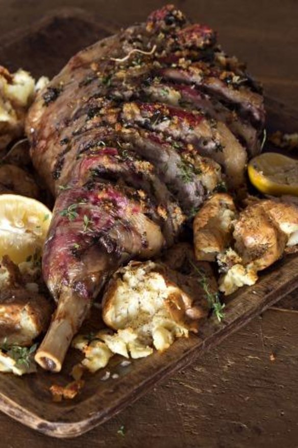 Slashed roast leg of lamb with crash-hot potatoes.