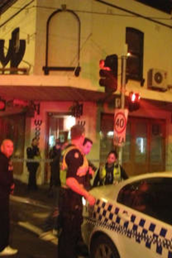 Police outside Woodstock Pizzicheria in Brunswick East.