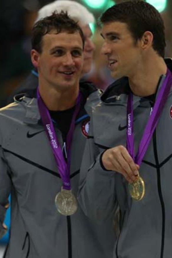 Rivals ... Michael Phelps, right, beat Ryan Lochte.