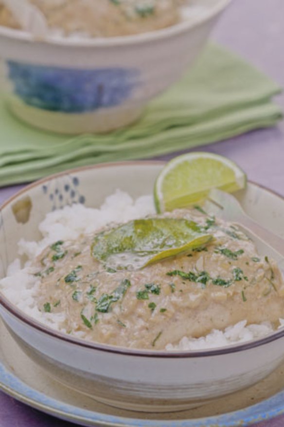 Baked fish with coconut and lime served on steamed rice.