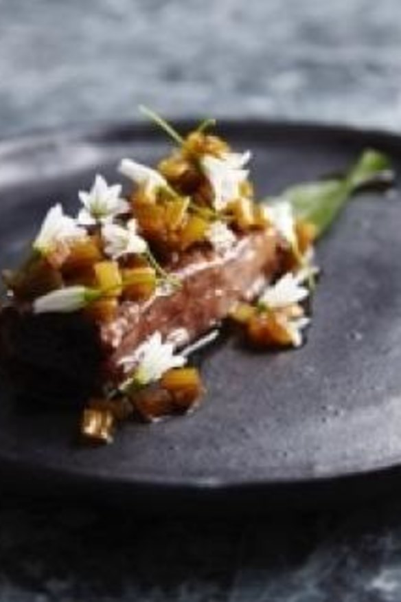 Beef short rib with roasted celery vinaigrette and garlic flowers is chef Peter Gunn's signature dish at his monthly pop-up dinners.