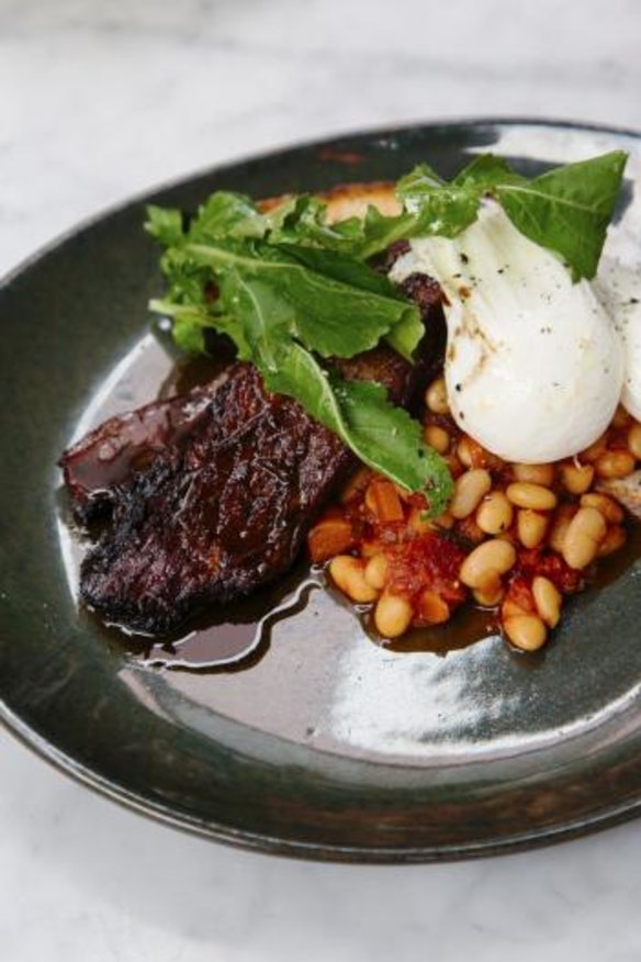 Brisket slow-cooked in coffee and bourbon with poached eggs and beans.