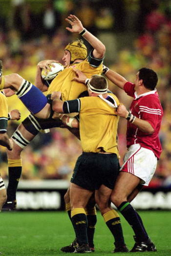 Leap into the unknown: Justin Harrison wins the lineout ball, and with it the Test and series.