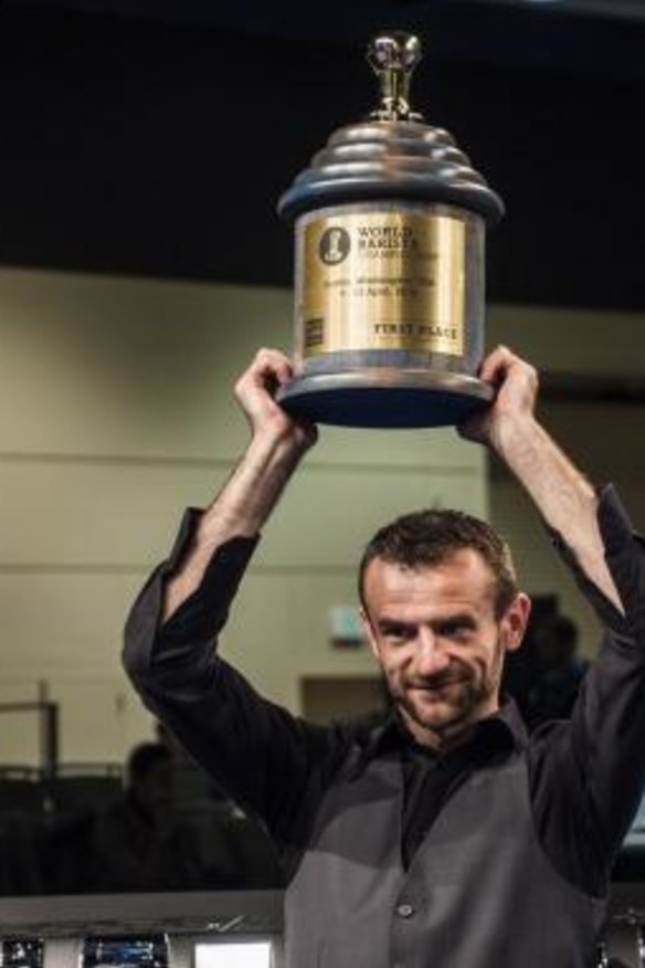 Canberra barista Sasa Sastic raises the trophy