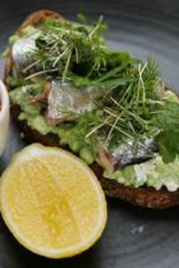 Sweet pea and feta smash on dark rye, with Spanish sardines and a lemon and herb crumb.