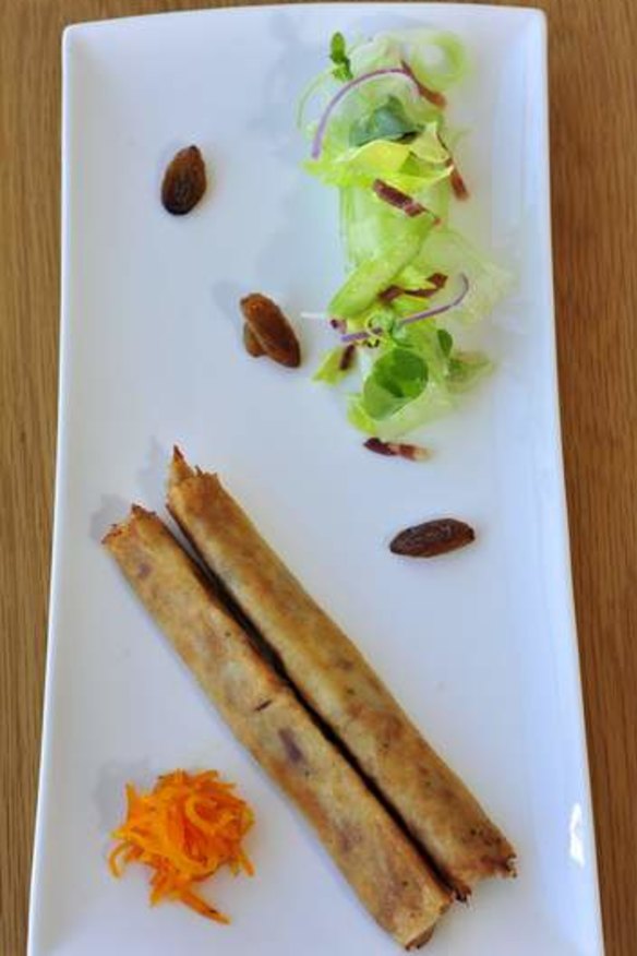 Braised rabbit croustillant with dried sultanas candied carrot and a celery and bacon salad at Onred.