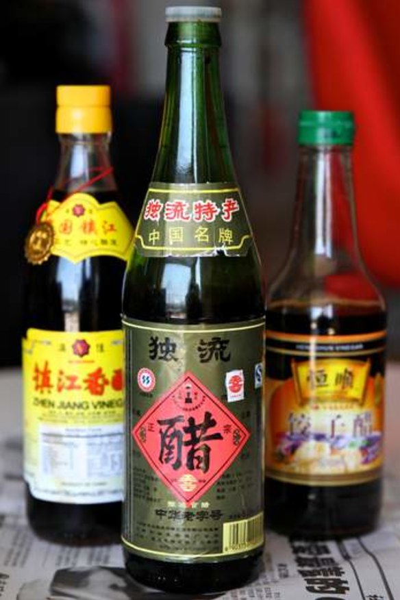 Bottles of black rice vinegar.