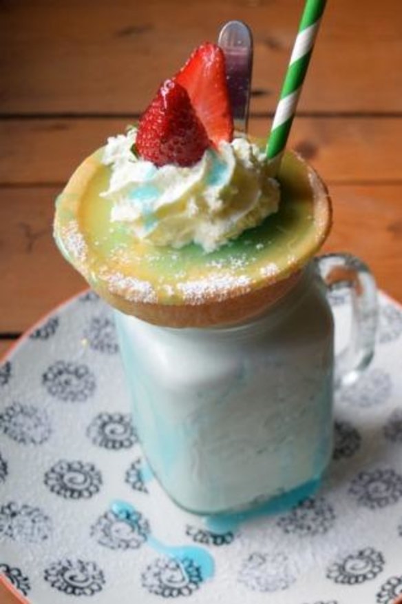The cafe's lemon-tart-topped Blue Heaven milkshake.