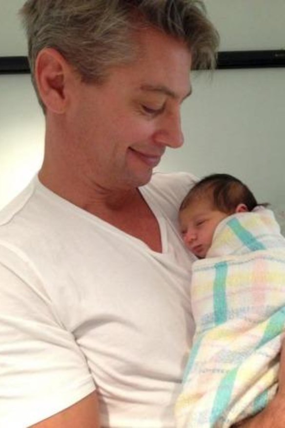 Snug: Luke Ricketson and his baby daughter Sophia Edie.