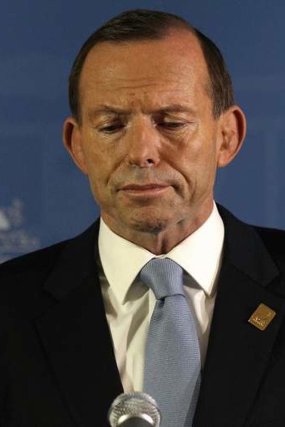 Prime Minister Tony Abbott defends his expenses claims to the media during a press conference in Bali.