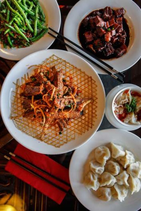 Extensive ... Lamb ribs with cumin, braised pork with soy sauce, stir-fried green beans with pork mince, wonton in hot chilli sauce and boiled dumplings with pork and cabbage.