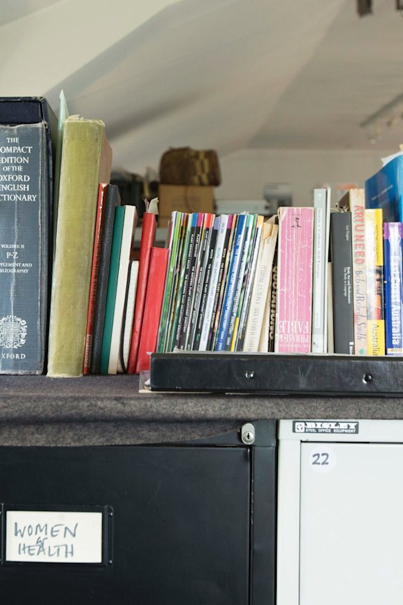 Books lined up inside Germaine Greer's Essex office.