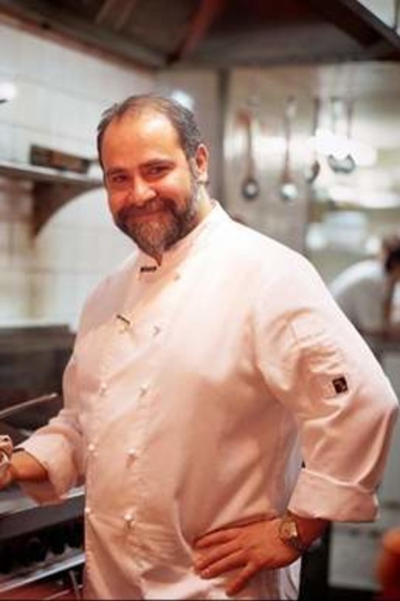Greg Malouf behind the pans.