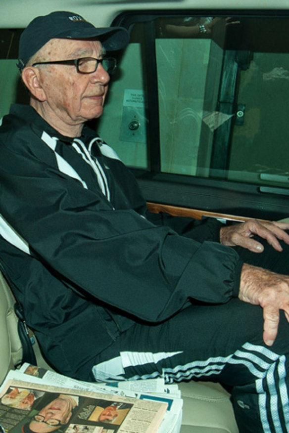 Rupert Murdoch is driven from his London home yesterday as News Corp starts taking water.