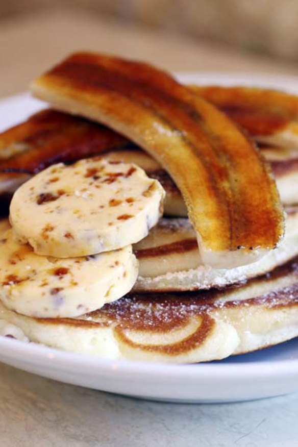 Buttermilk pancakes with caramelised banana, maple syrup and praline butter.