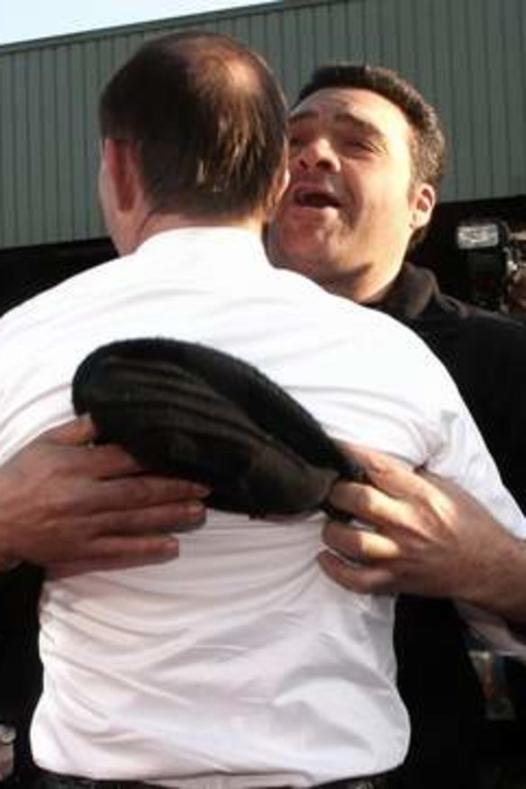 Exuberant reception: The Opposition Leader meets fans at Flemington.