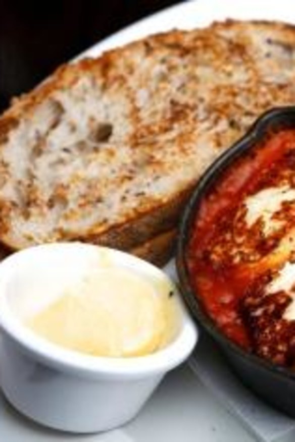 A cracker:  Trunk  Diner's Haloumi  and baked eggs.