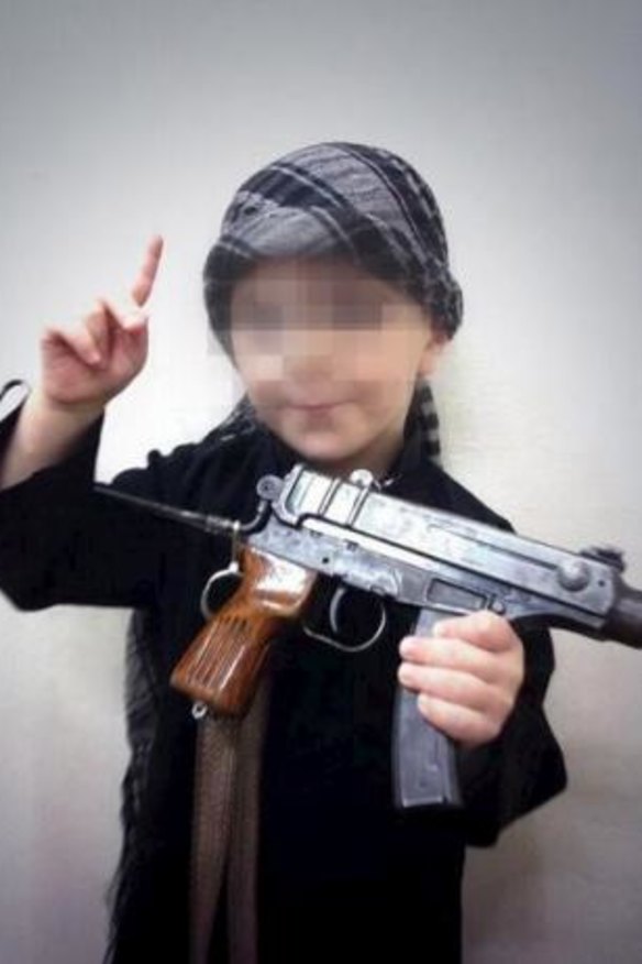 Sharrouf posted pictures of himself and his son (pictured) on Twitter.