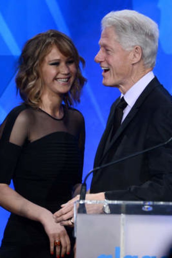 Former US president Bill Clinton with actor Jennifer Lawrence.