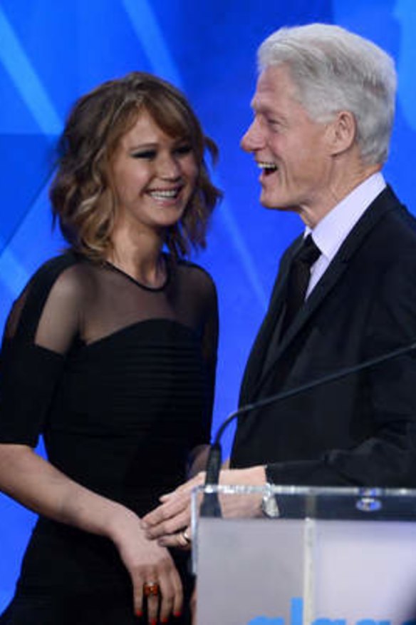 Former US president Bill Clinton with actor Jennifer Lawrence.